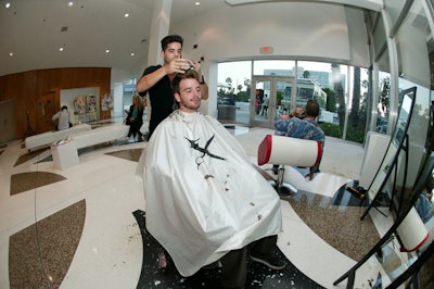 Willing attendees at the Class trade show got haircuts from Barracuda Hair stylists.