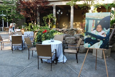 In the courtyard, organizers displayed posters of children helped by the Herbie Fund.