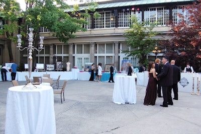Guests had the opportunity to bid on items in a silent auction during the cocktail reception in the courtyard.