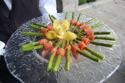 Servers passed hors d'oeuvres like salmon-wrapped asparagus during the cocktail reception.