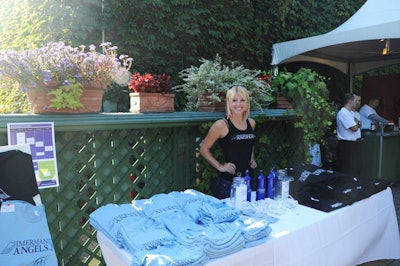 Volunteers from Imerman Angels staffed tables selling merchandise with the charity's logo.