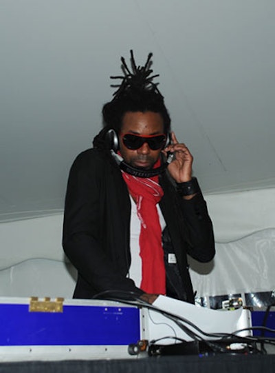 DJ Madrid spun inside the tent that housed the runway.