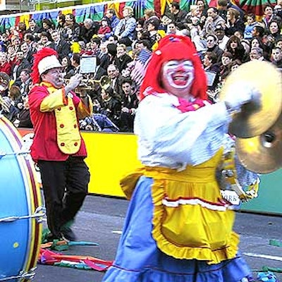 A marching band from the Funny Factory Clown Band performed for the huge crowd of kids and their parents.