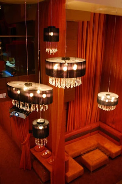 MIA at Biscayne has 24-foot ceilings in the main dining room, sheer red draping, and decorative chandeliers.