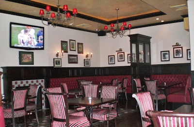 Waxy's on the River has a red, black, and white color scheme and more than 15 wall-mounted TVs that can be used for presentations or entertainment purposes.