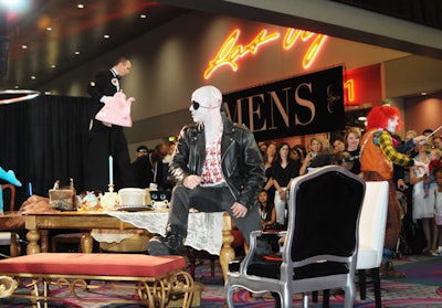 The Mad Hatter-inspired party replaced the typical runway in the convention center's Grand Lobby.