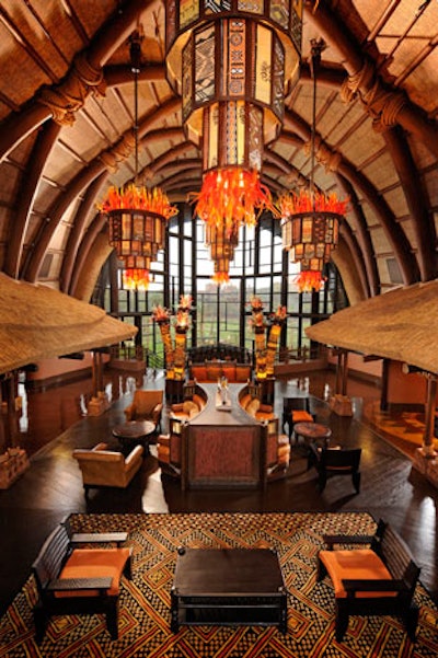 Kidani's vaulted lobby includes a thatched ceiling and giant windows overlooking the savannah.
