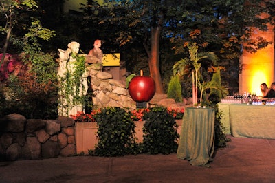 A large apple sculpture sat atop a pedestal in the courtyard, where servers at two bars offered a selection of Skyy Vodka cocktails.
