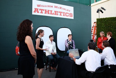 Guests could pick up student IDs bearing their own images at a photo station.