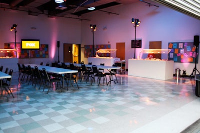 Chairs and tables in the school's cafeteria provided seating for guests, who dined on lunch-line staples like mashed potatoes, pizza, and mac and cheese.