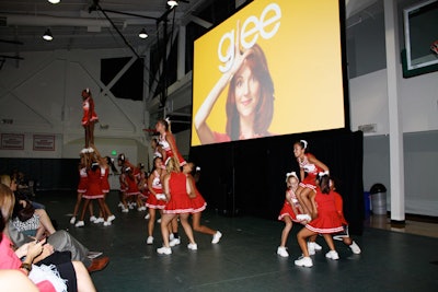 Cheerleaders performed to start the screening in the Willows school's gym.