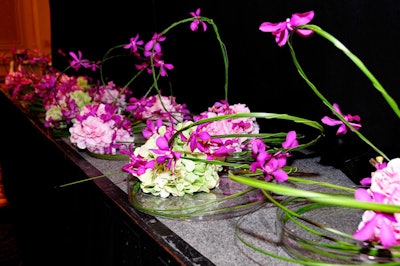 Kehoe Designs provided pink and white floral arrangements.