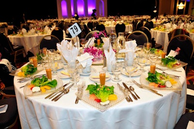 The Hilton Chicago catered a three-course meal that began with goat-cheese-topped salads and chilled soup shooters.