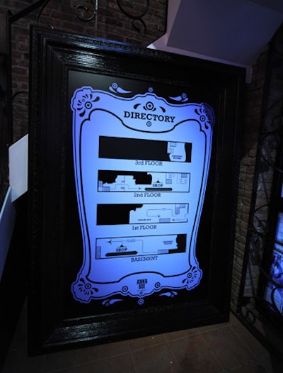 Matching the color palette and aesthetic of the store, the directory for the pop-up was displayed in an ornate black frame.