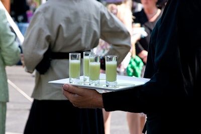 Passed hors d'oeuvres included shots of chilled Granny Smith apple soup.