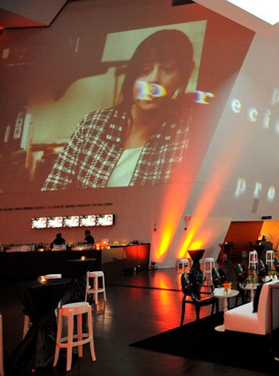 Orange lighting and images from the film were projected onto the walls in the museum's Hyacinth Gloria Chen Crystal Court, where 300 guests attended the reception.