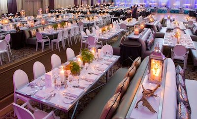 The inductee seating area featured silver and white decor with antler accents and fern centerpieces.