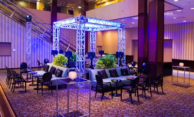 Furnishings from Contemporary Furniture Rentals surrounded a lighting truss in the lounge area.