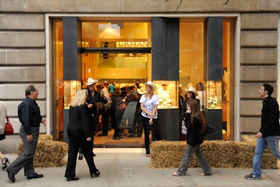 Yee haw! Hay bales and cowboy hats perfectly capture Fashion's Night Out's sense of fun and friendliness.