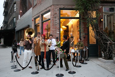 Red Baraat, a band that plays bhangra and brass funk music, performed outside Ports 1961's West Village store. Inside, the label hosted an exhibit of Indian artwork alongside its racks of clothing.