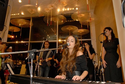 Elie Tahari's marketing team brought in Billy Joel's daughter Alexa Ray Joel to perform at the SoHo boutique.