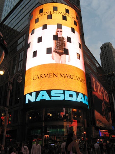 On Sunday evening, Carmen Marc Valvo made the most of a Nasdaq sponsorship by using the stock exchange company's Times Square building as the site of his presentation. On the facility's JumboTron, Valvo broadcast a taped runway presentation of his collection.