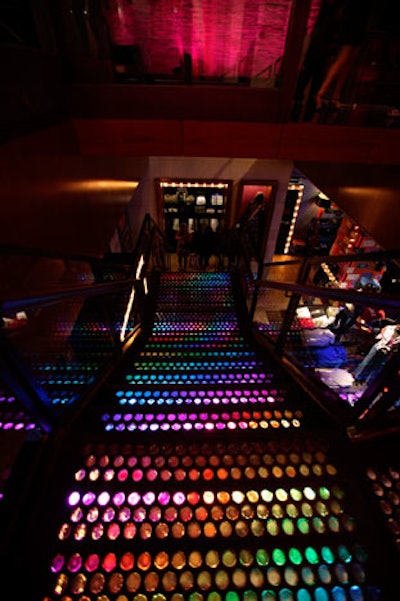 The staircase to the mezzanine was illuminated in a rainbow of hues.