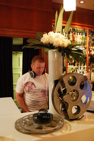 Film reels topped the DJ booth at the InterContinental Hotel's Proof Vodka Bar for a costume in film celebration hosted by the Canadian Alliance of Film & Television Costume Arts & Design.