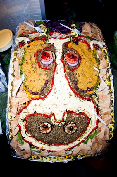Free Times Café fashioned a vegan cow out of hummus, lentils, and vegetables for the PETA fund-raiser.
