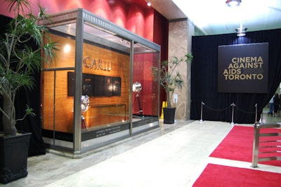 A red carpet and vintage searchlights added to the Old-Hollywood feel in the elevator lobby on the ground floor of the Carlu.