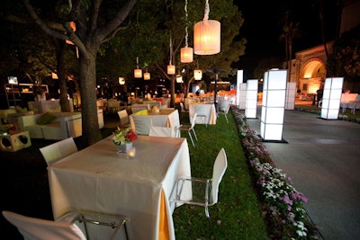 Fringed white lanterns hung overhead.
