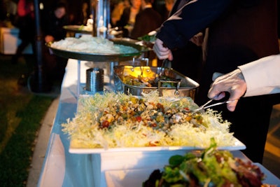 Wolfgang Puck set up dinner buffets that included chopped hearts of palm salad with artichokes, tomatoes, sweet corn, chick peas and Roquefort vinaigrette.