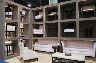 American Contract Seating displayed its chairs, side tables, and sofas in a three-level, alcove-style booth designed and constructed in house.