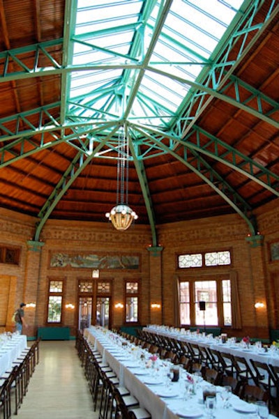 Conference attendees dined at communal tables under Cafe Brauer's skylight.