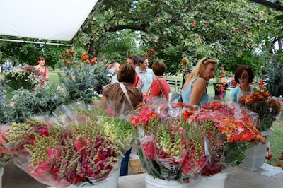 At the Green City Market, stalls offer bouquets of local flowers.