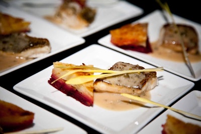 Servers offered seared Ontario pickerel with riesling, lemon, and caper sauce and potato and Niagara beet torte to guests.