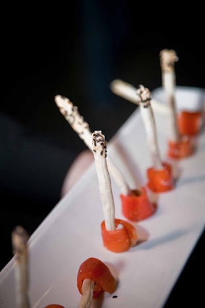 Hors d'eouvres included gin, dill, and beet cured salmon wrapped around a homemade sesame breadstick with goat cheese, caper, and red onion.