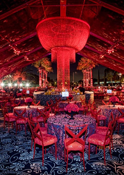 The evening's visual focal point was a 20-foot wide red chandelier hanging from the translucent V.I.P. tent.