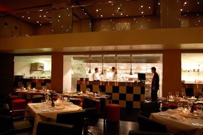 The exhibition kitchen in the main dining room has an adjacent eight-seat chef's table.