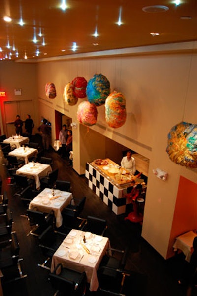 The 138-seat main dining room is accented with pops of color and several pieces of artwork by Sheila Hicks.