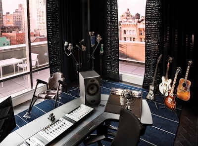 Esquire's high-tech bachelor pad also has a fully functioning studio designed by Denise Kuriger and sponsored by Diesel. Blue Microphones outfitted the space with Gibson guitars, mixing decks, an electronic keyboard from Moog, and microphones.
