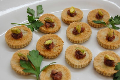 A Spanish-themed menu included hors d'oeuvres like blue cheese shortbread served with black pepper and date chutney and pistachio.