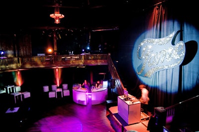 The party's main room included the movie's logo, lounge furniture, a DJ booth, and a bar.
