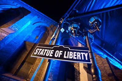 New York-style street signs and lamp posts decorated the outside of the party venue.