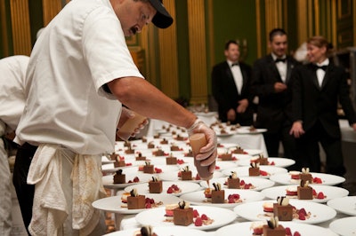 Design Cuisine set up shop in the Mellon's Center Green Room, where the chefs plated more than 400 desserts, a raspberry and caramel ice cream tuille with chocolate mousse.