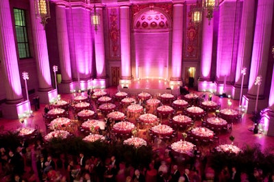 JBL Floral separated the evening's cocktail area from the reception space with a row of areca palms.