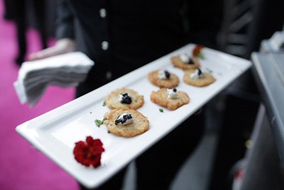 Contemporary Catering passed trays of hors d'oeuvres.