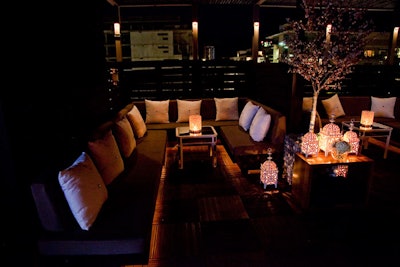 White cushions adorned with crystals topped furnishings on the south rooftop at the Spoke Club.