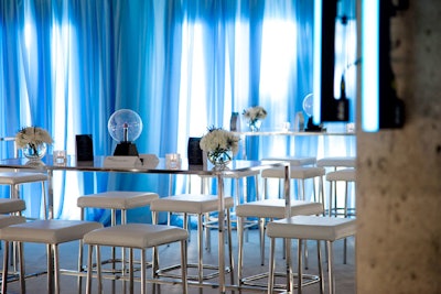 Electric plasma balls topped communal tables in one of two lounge areas at Roy Thomson Hall.