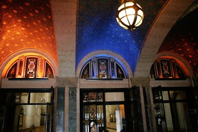 Vaulted ceilings decorated in starry patterns mimic the look of the main room.